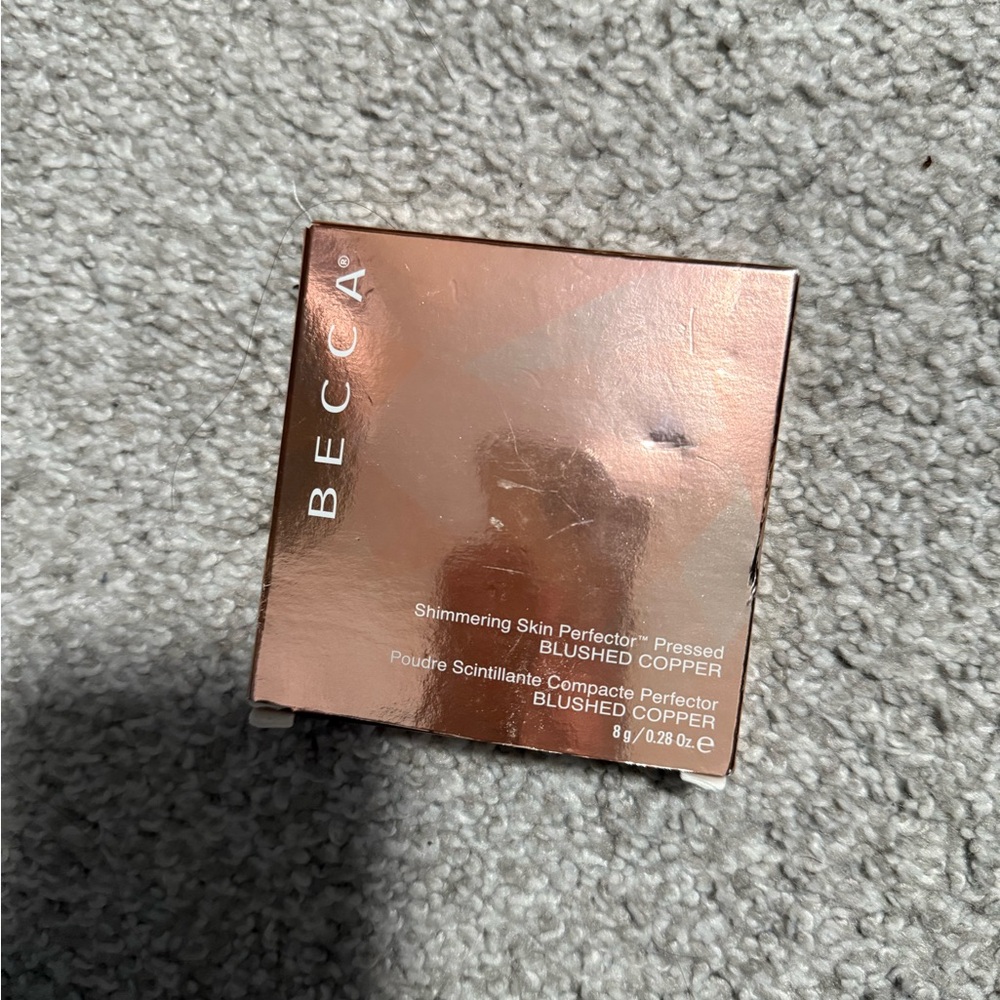 BECCA Brown Highlighter Compact